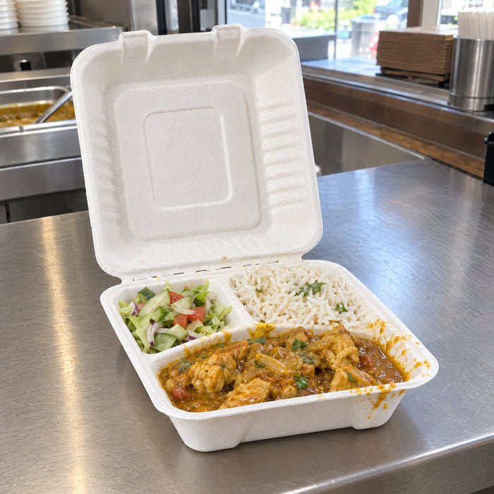 Chicken curry, rice and salad in a 3-compartment bagasse clamshell