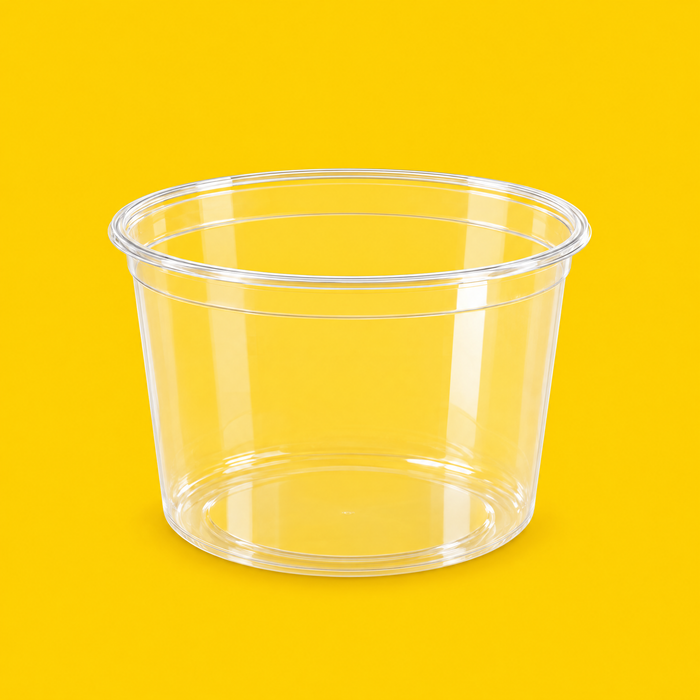 Clear PET round deli container 355ml, three-quarter view on yellow