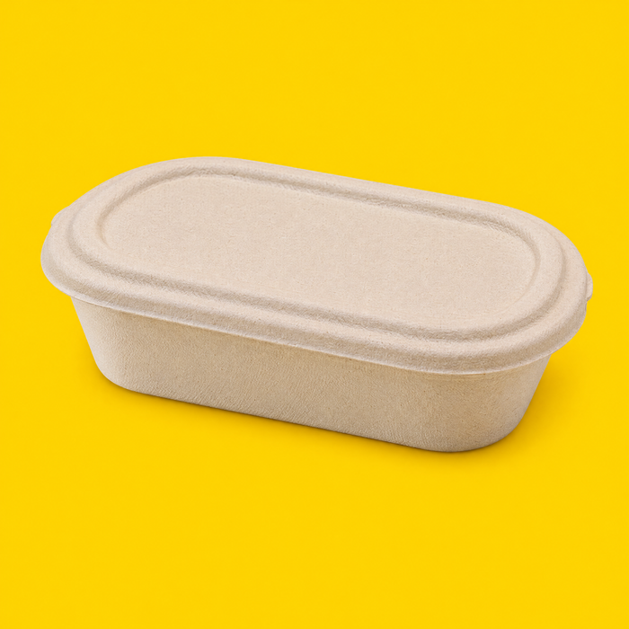 Natural bagasse oval lid fitted on a 650ml oval salad bowl, on yellow