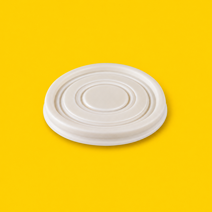 Cornstarch lid for 2oz sauce pot, on yellow