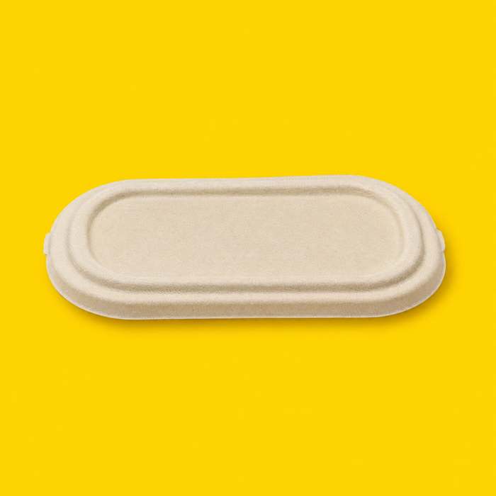 Natural bagasse oval salad bowl lid, on yellow