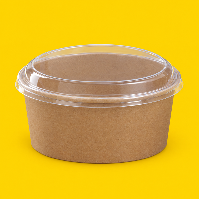 Brown kraft round salad bowl 750ml with clear lid fitted, on yellow