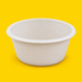 Natural bagasse round bowl 1000ml, on yellow