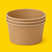 Stack of brown kraft round salad bowls 1000ml, on yellow