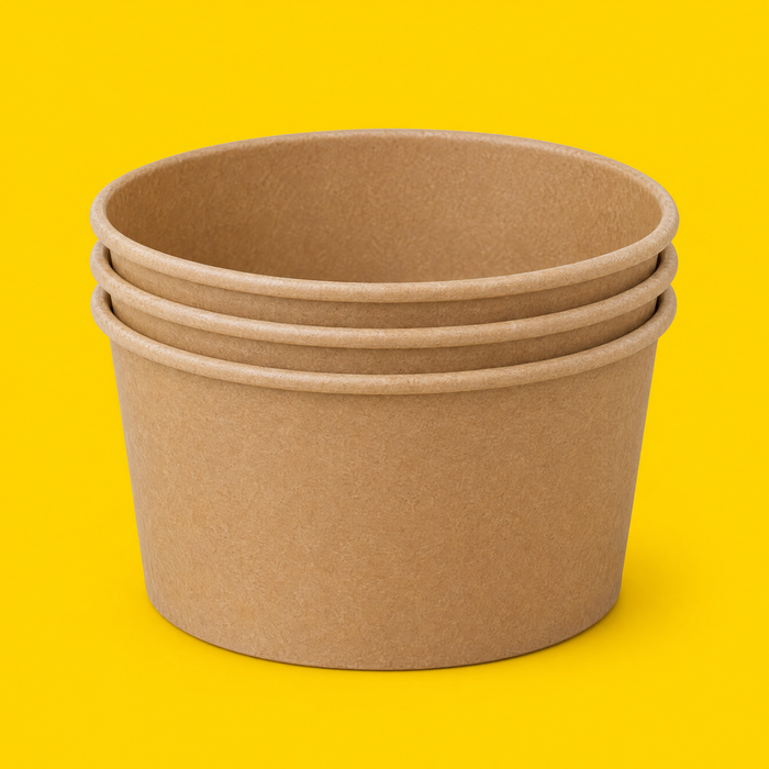 Stack of brown kraft round salad bowls 1000ml, on yellow