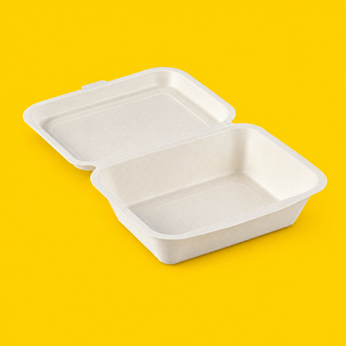 White bagasse 7x5 inch clamshell, open, on yellow