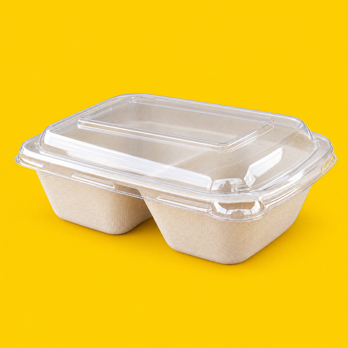 Clear PET lid fitted on a bagasse 2-compartment tray, on yellow