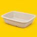 Natural bagasse rectangular tray 1000ml, on yellow