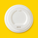 White CPLA domed sip-thru lid 90mm, on yellow