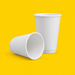 Two white double wall hot cups 473ml (16oz), on yellow