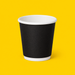Black double wall espresso cup 120ml (4oz), on yellow