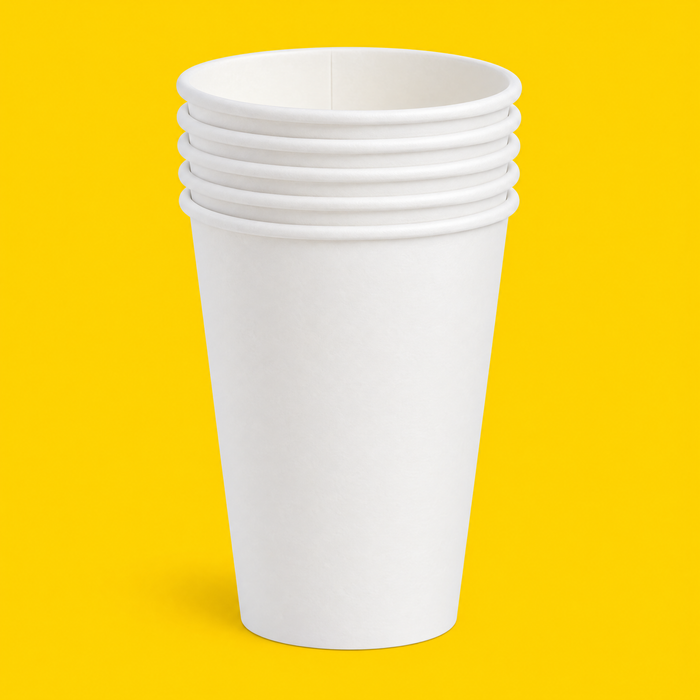 Stack of white single wall hot cups 473ml (16oz), on yellow
