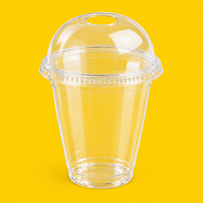 Clear rPET dome lid fitted on a 12oz smoothie cup, on yellow