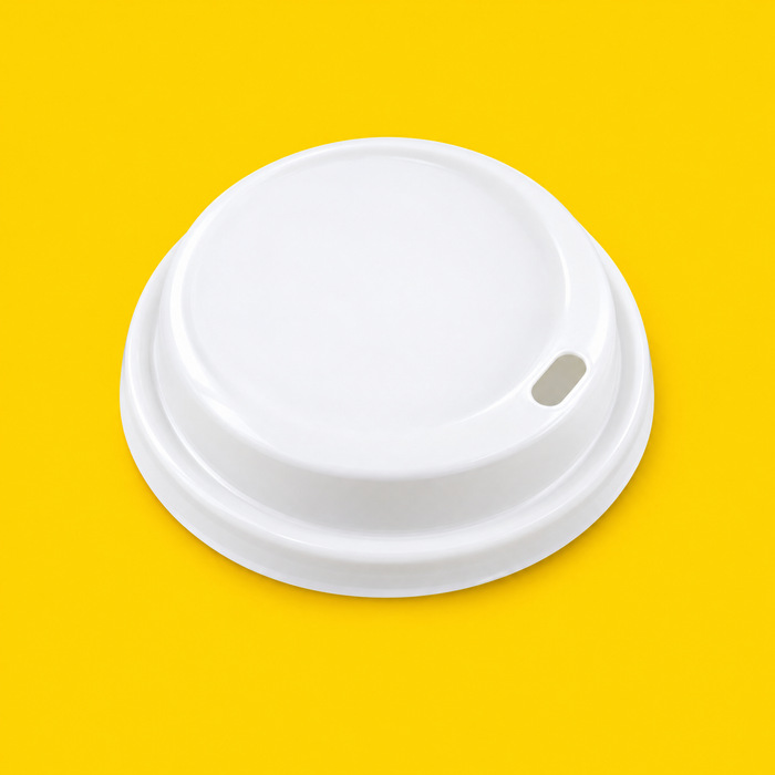 White domed sip-thru lid for 4oz cups, on yellow