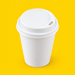 White domed sip-thru lid fitted on a 4oz paper cup, on yellow