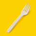 Close-up of a natural bagasse fork 162mm, on yellow