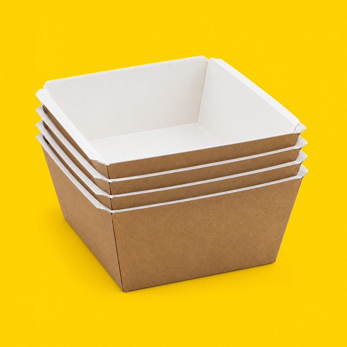 Stack of small kraft paper food trays 500ml, on yellow