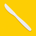 Close-up of a white cornstarch knife, on yellow