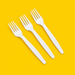 Three white cornstarch forks 7 inch, on yellow
