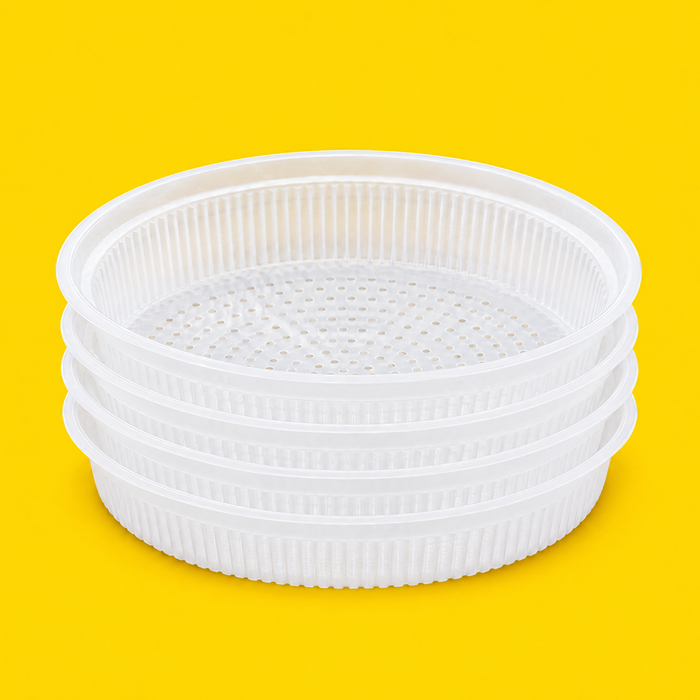 Stack of shallow PP drainage inserts, on yellow