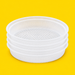 Stack of shallow PP drainage inserts, on yellow