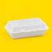 White bagasse 9x6 inch clamshell, closed, on yellow